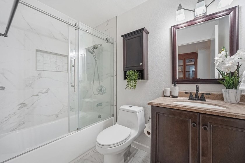 Welcome home to this beautifully updated townhome nestled in a - photo 15