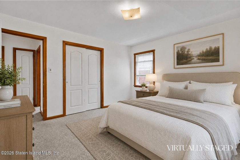 Extremely well-maintained 2-family Cape in the heart of Dongan - photo 12