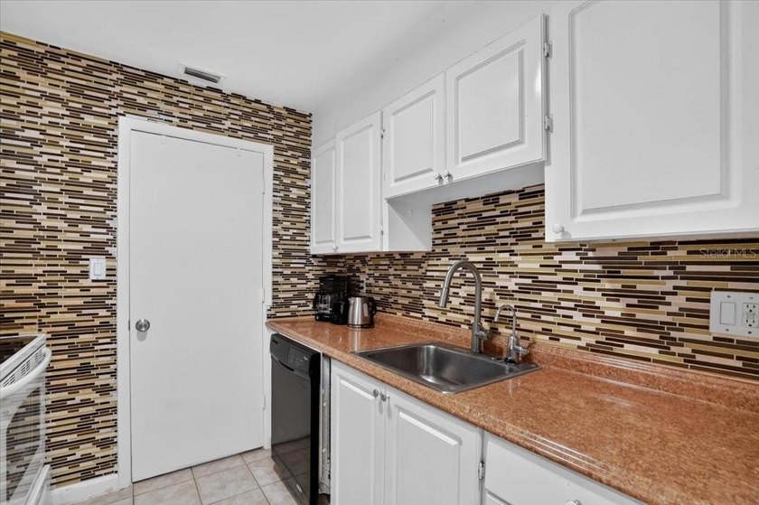 Welcome to this well-maintained, fully furnished ground-floor - photo 8