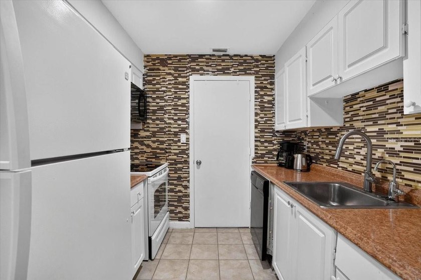 Welcome to this well-maintained, fully furnished ground-floor - photo 10
