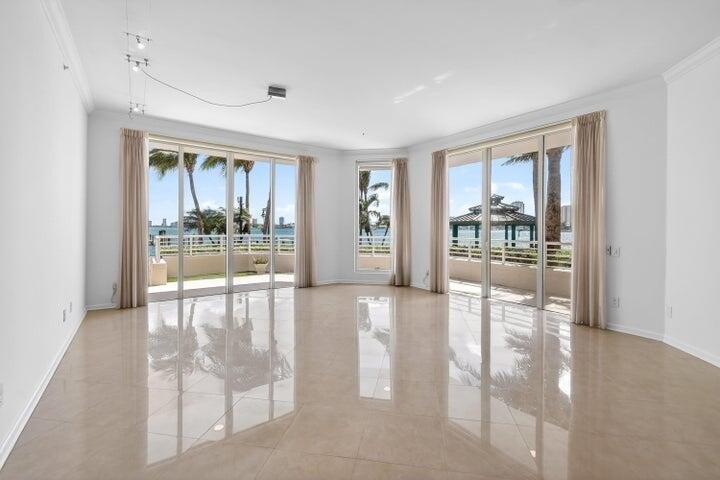 Located in the prestigious gated waterfront community of Marina - photo 11