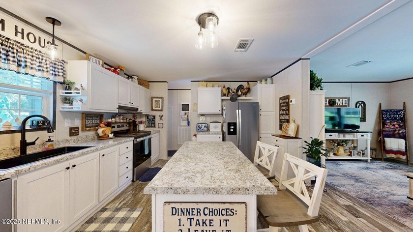 Welcome home to this like-new 2024 manufactured home situated on - photo 14