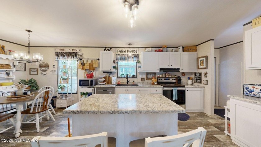 Welcome home to this like-new 2024 manufactured home situated on - photo 15
