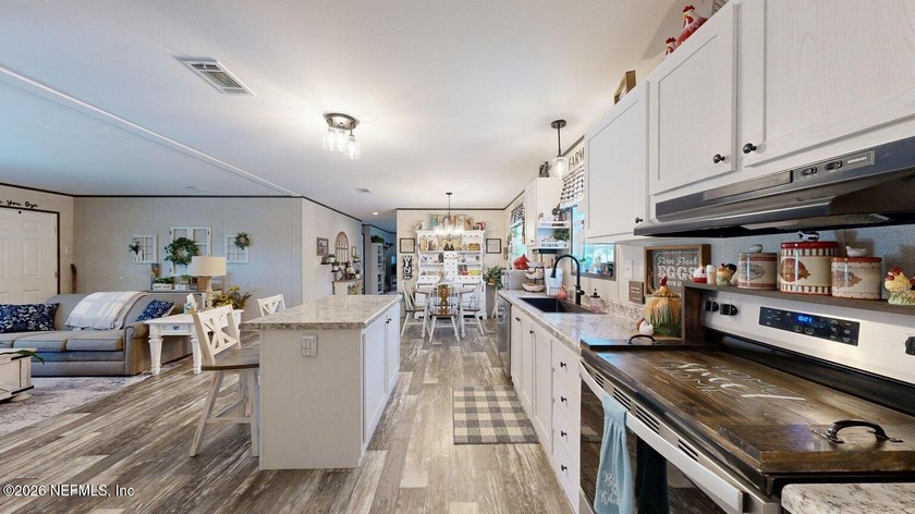 Welcome home to this like-new 2024 manufactured home situated on - photo 16