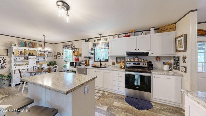 Welcome home to this like-new 2024 manufactured home situated on - photo 17