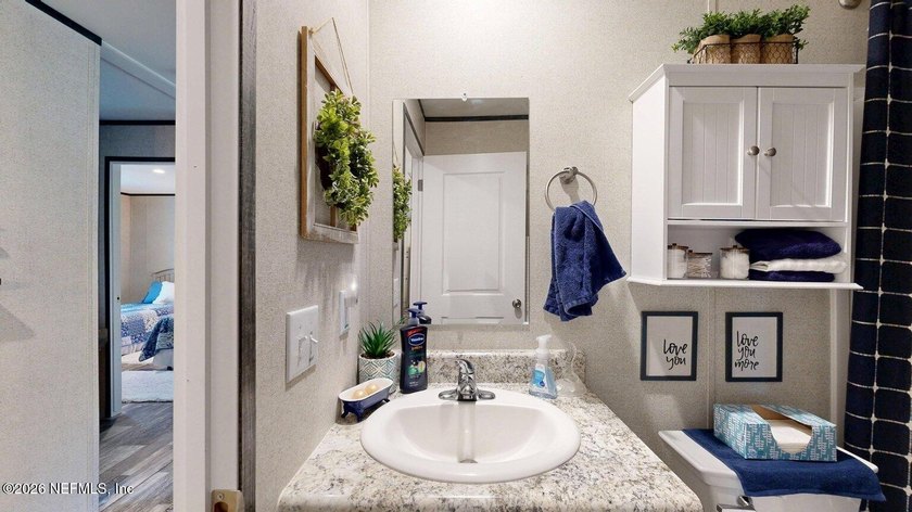 Welcome home to this like-new 2024 manufactured home situated on - photo 20