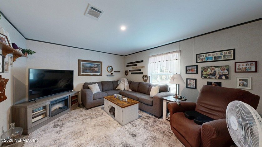 Welcome home to this like-new 2024 manufactured home situated on - photo 21