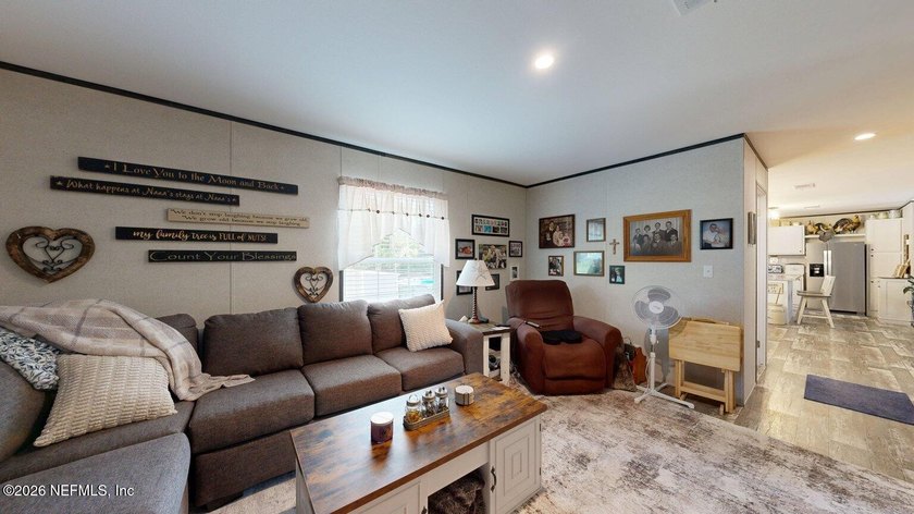 Welcome home to this like-new 2024 manufactured home situated on - photo 22