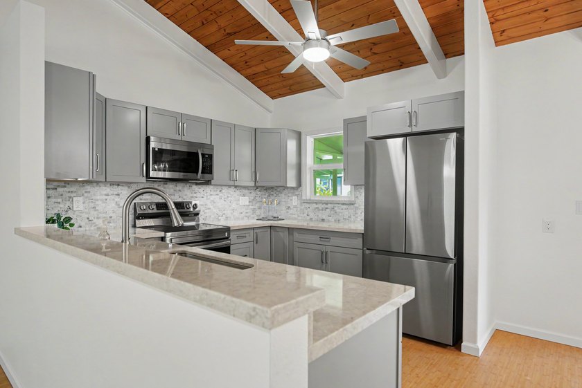 Completely renovated and thoughtfully remodeled, this home is - photo 6