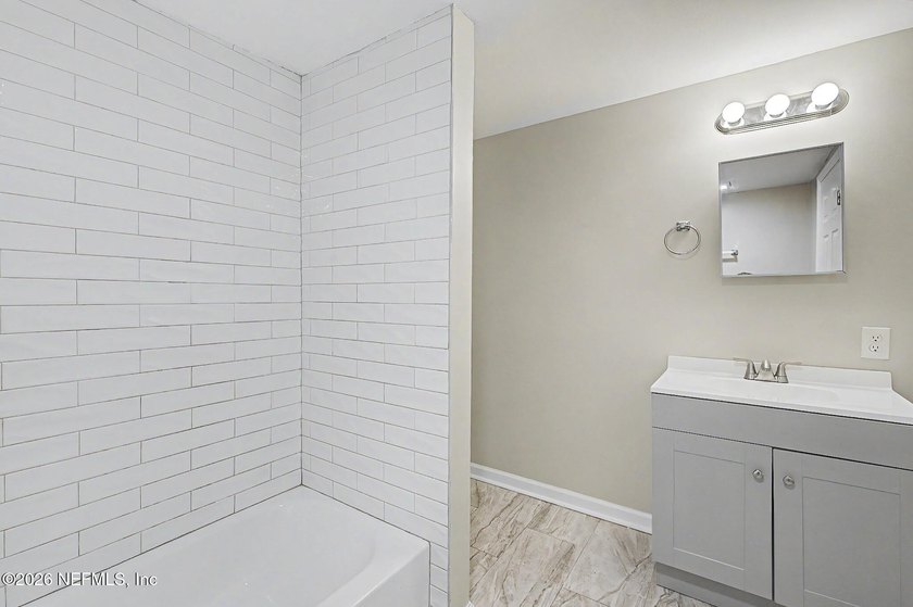 Fresh renovated 4-bedroom, 2-bath single-family home just - photo 14