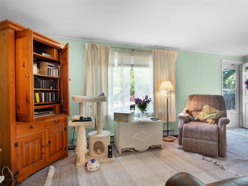 Welcome to this charming lakeside retreat tucked away on a - photo 11