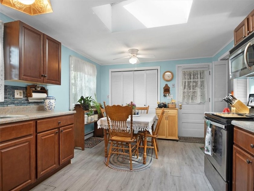 Welcome to this charming lakeside retreat tucked away on a - photo 13