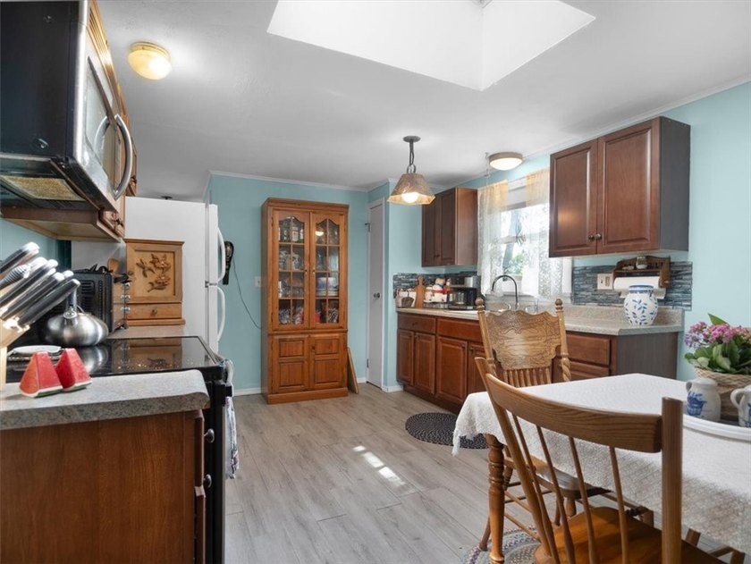Welcome to this charming lakeside retreat tucked away on a - photo 16