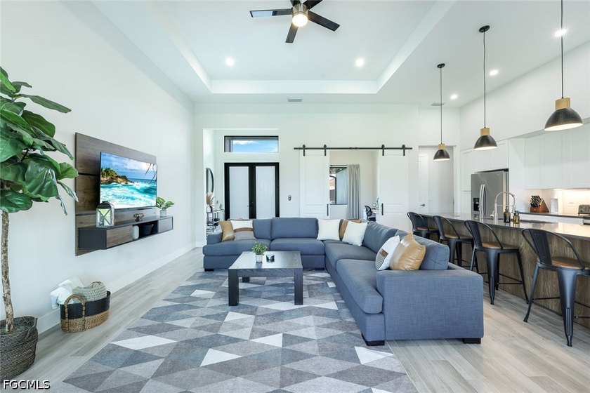 Elegantly designed with an open-concept floor plan, the home - photo 3