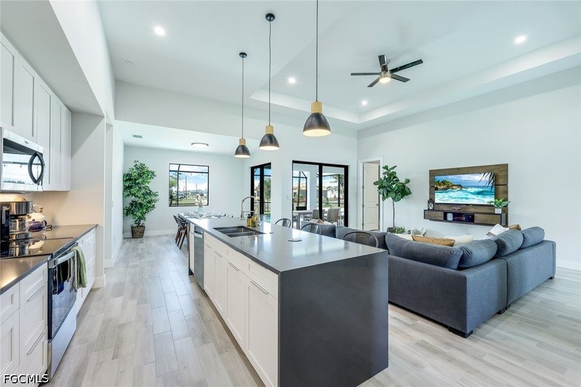 Elegantly designed with an open-concept floor plan, the home - photo 8