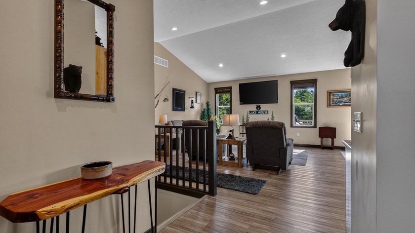 Enjoy lakefront living in this 4-bedroom, 3-bath home on scenic - photo 11