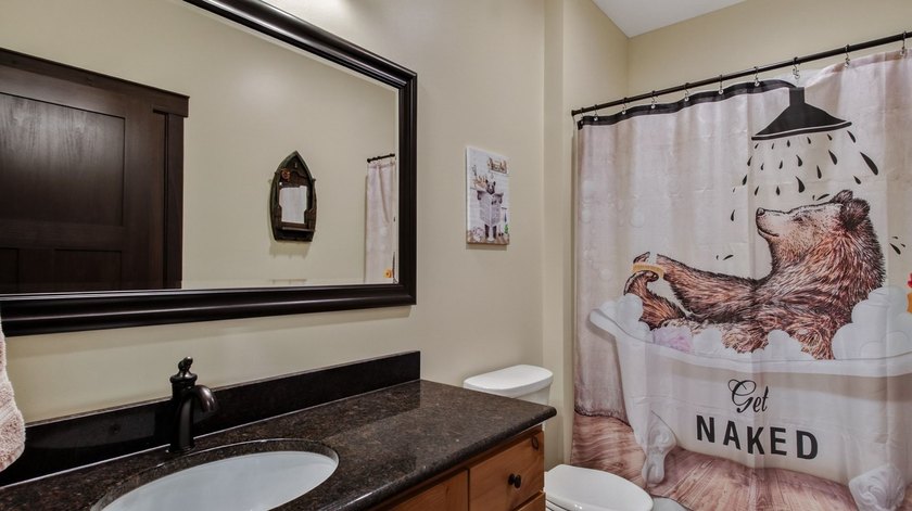 Enjoy lakefront living in this 4-bedroom, 3-bath home on scenic - photo 18