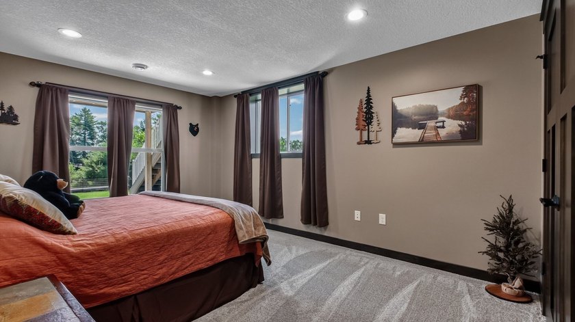 Enjoy lakefront living in this 4-bedroom, 3-bath home on scenic - photo 25