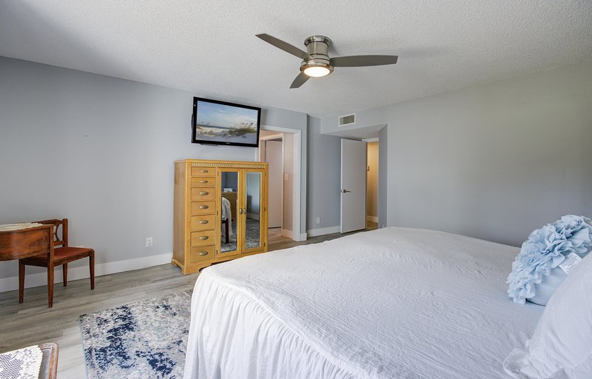 YOU WILL WANT THIS 1ST FLOOR... END UNIT ...WITH IMPACT GLASS - photo 12