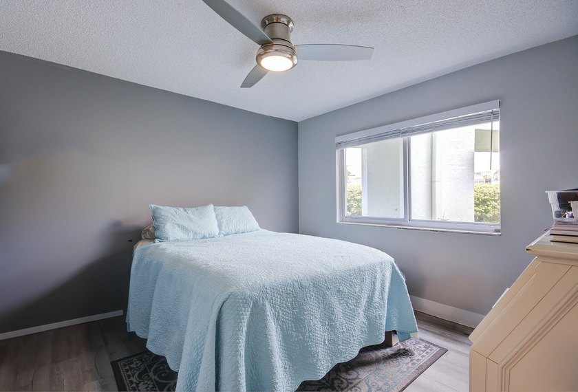 YOU WILL WANT THIS 1ST FLOOR... END UNIT ...WITH IMPACT GLASS - photo 17