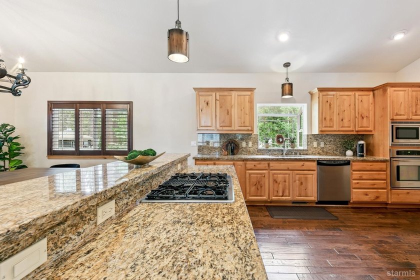 Located in the desirable Tahoe Island Park neighborhood, this - photo 19
