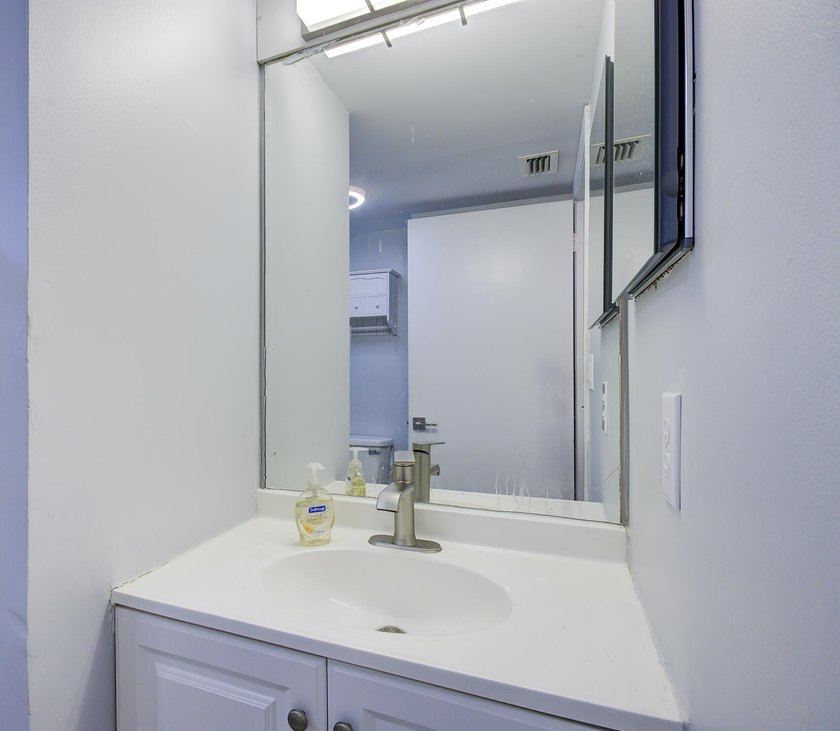YOU WILL WANT THIS 1ST FLOOR... END UNIT ...WITH IMPACT GLASS - photo 22