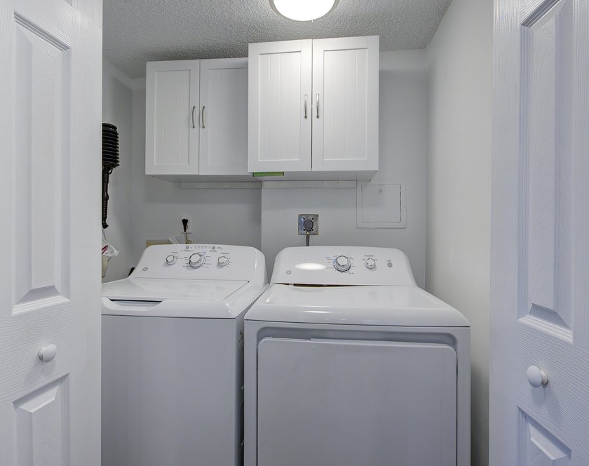 YOU WILL WANT THIS 1ST FLOOR... END UNIT ...WITH IMPACT GLASS - photo 23