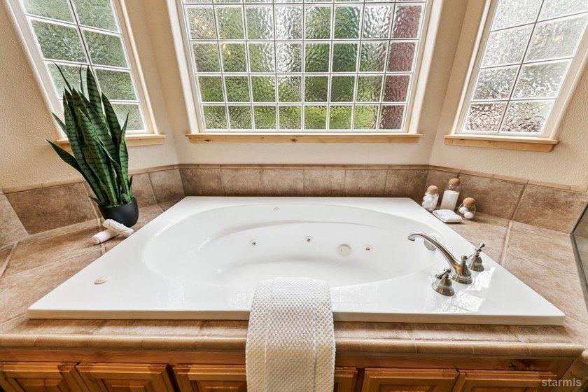 Located in the desirable Tahoe Island Park neighborhood, this - photo 29