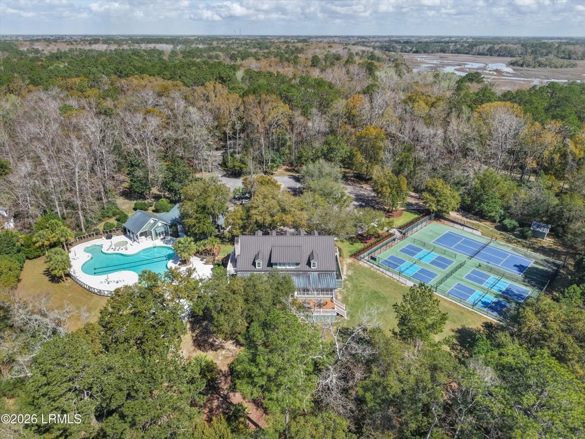 Tucked away on a quiet cul-de-sac in the gated community of Bull - photo 30