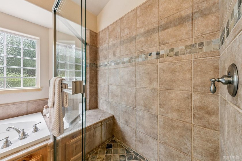Located in the desirable Tahoe Island Park neighborhood, this - photo 30