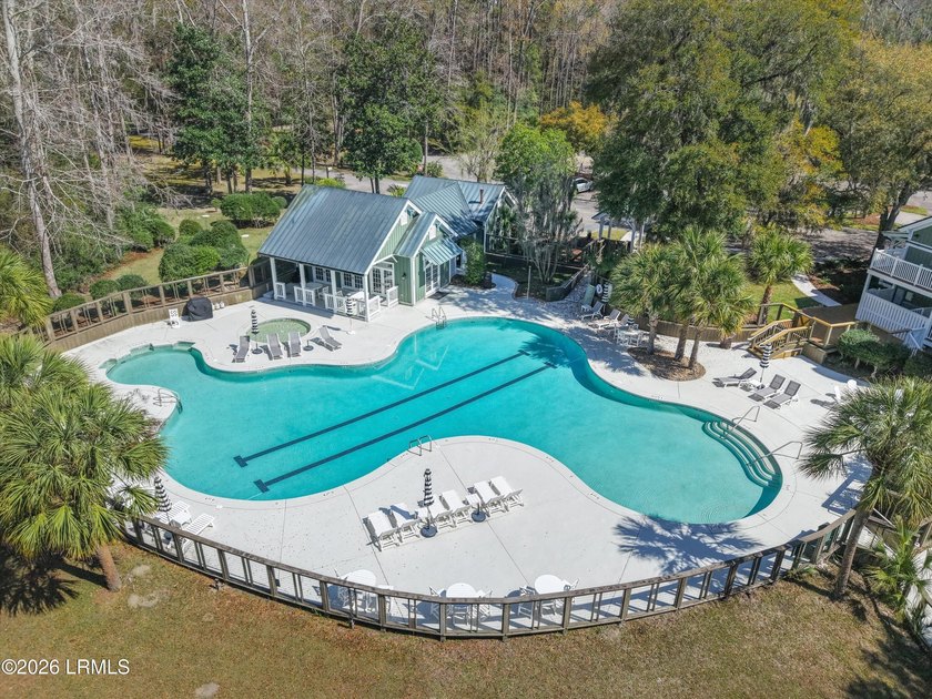 Tucked away on a quiet cul-de-sac in the gated community of Bull - photo 32