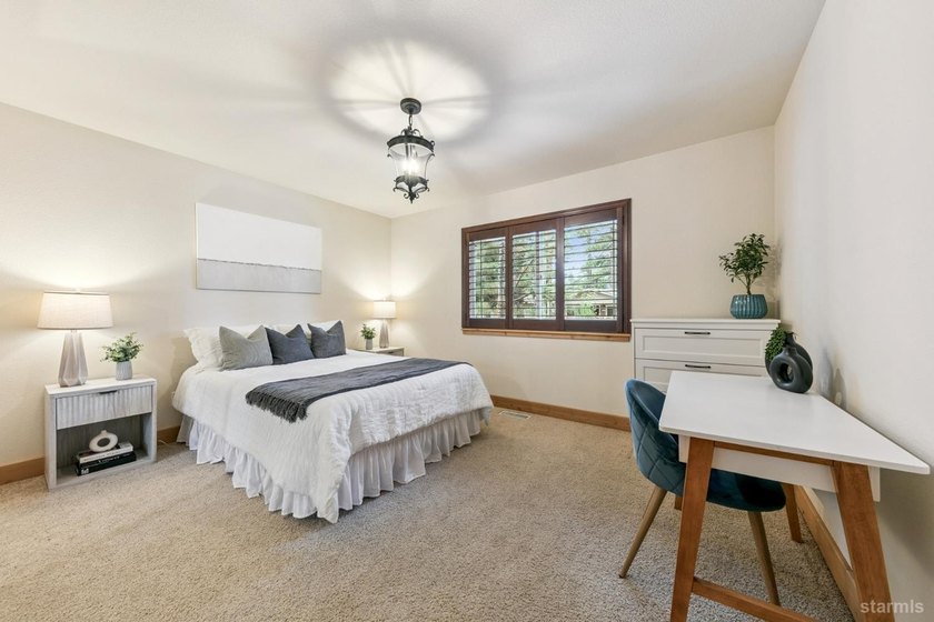 Located in the desirable Tahoe Island Park neighborhood, this - photo 37