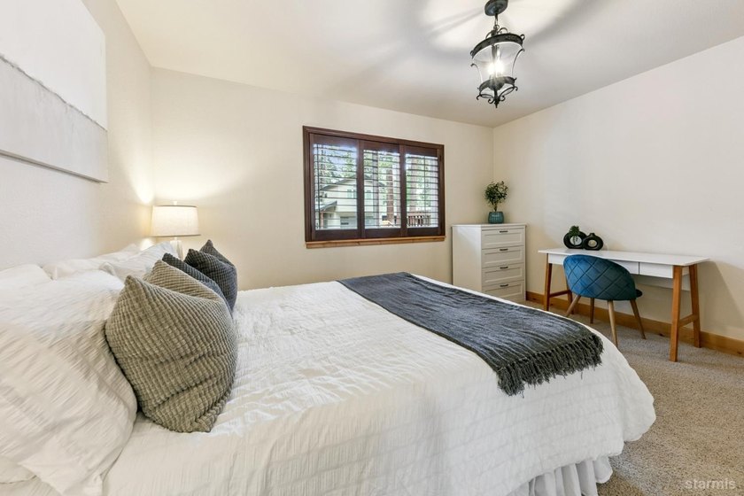 Located in the desirable Tahoe Island Park neighborhood, this - photo 38