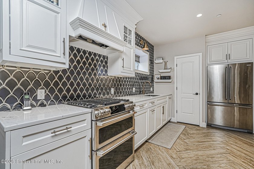 Welcome to 17 Joline Avenue, a custom-built Center Hall Colonial - photo 44