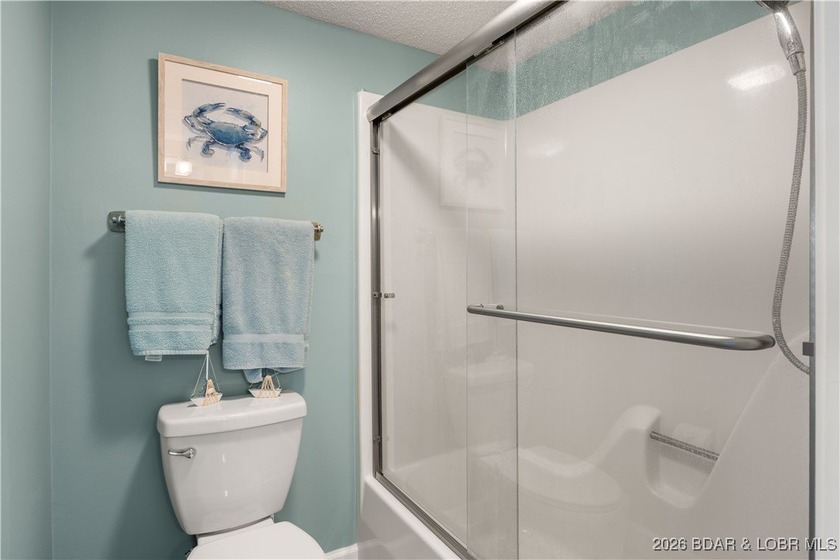 Enjoy lake life at its finest in this beautifully styled 3-bed - photo 19
