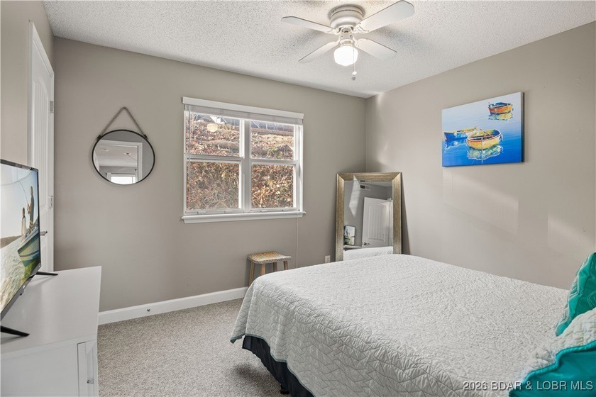 Enjoy lake life at its finest in this beautifully styled 3-bed - photo 20