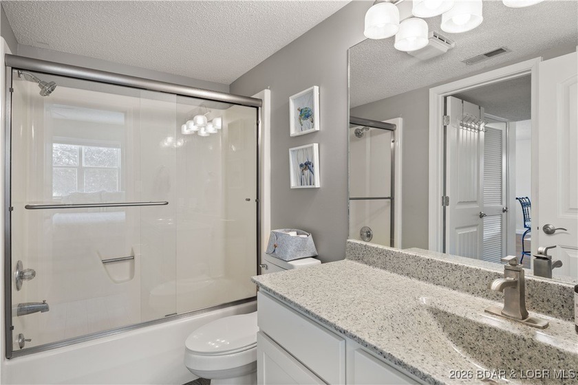 Enjoy lake life at its finest in this beautifully styled 3-bed - photo 24