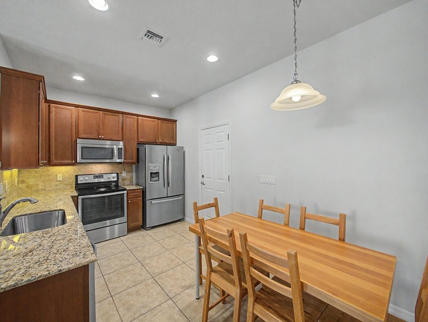 Highly sought after Sandpiper Cove Botanica townhome, In the - photo 14