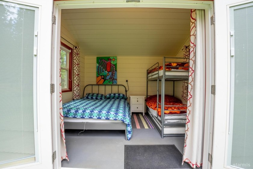 This property features a main single-family home alongside a - photo 23