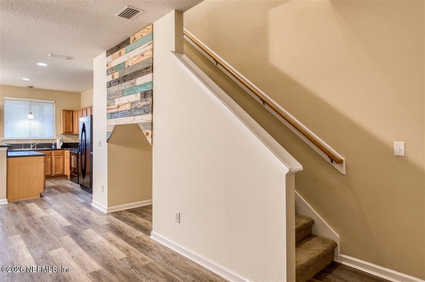 Welcome home to this spacious townhome featuring two upstairs - photo 3