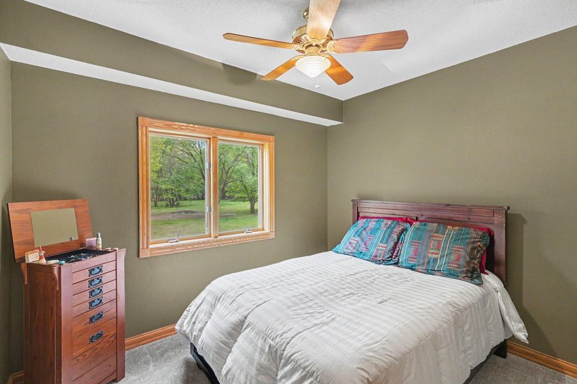 Immaculate walkout rambler nestled on 2 secluded acres in East - photo 16