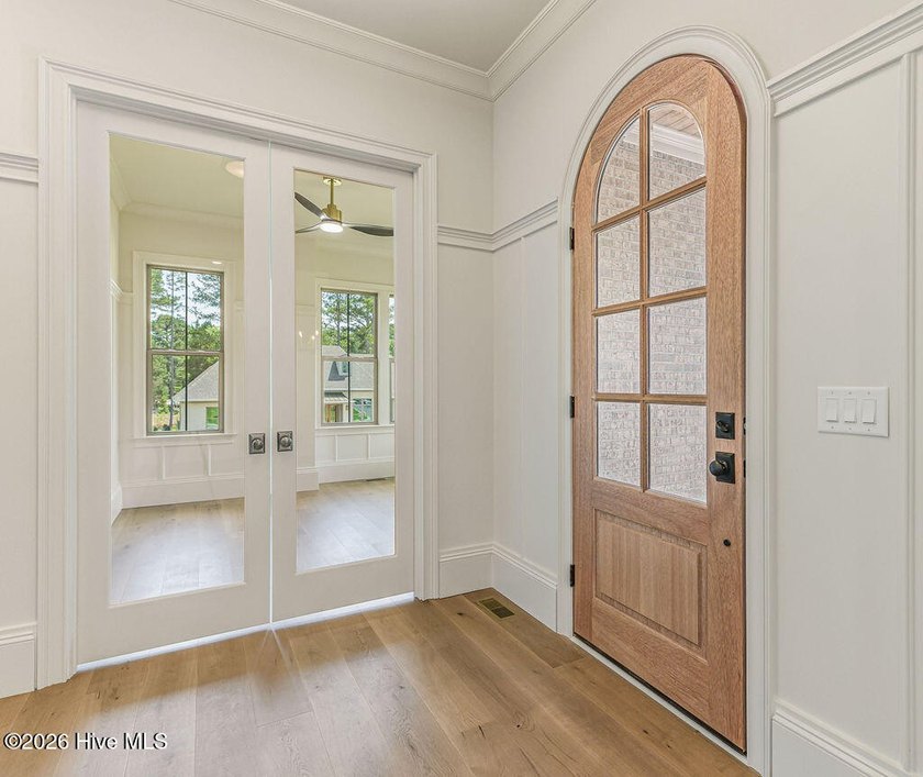 This grand home offers an impressive layout filled with style - photo 16