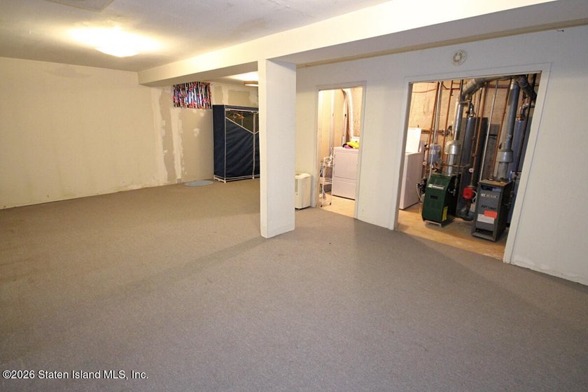 Excellent opportunity to own a 2-family semi-attached home in a - photo 18