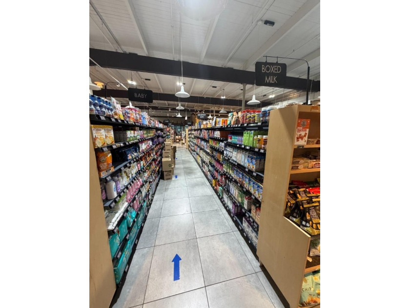 This strategically located grocery store presents an outstanding - photo 23
