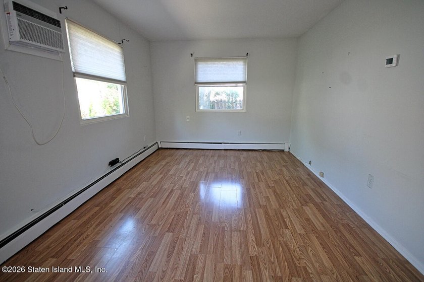 Excellent opportunity to own a 2-family semi-attached home in a - photo 25