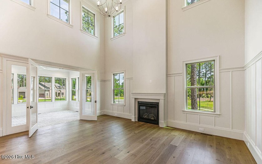 This grand home offers an impressive layout filled with style - photo 28