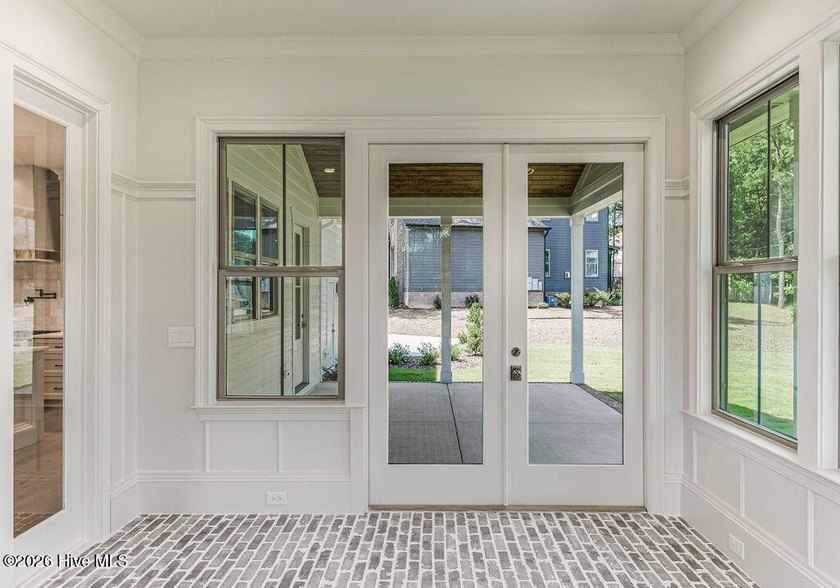 This grand home offers an impressive layout filled with style - photo 31