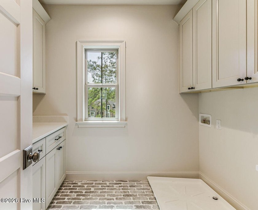 This grand home offers an impressive layout filled with style - photo 52