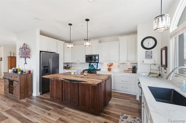 Experience the best of downtown Northville living in this - photo 5
