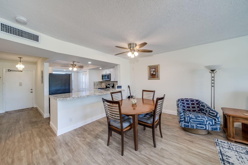Nestled in a vibrant 55+ community, this completely remodeled in - photo 12
